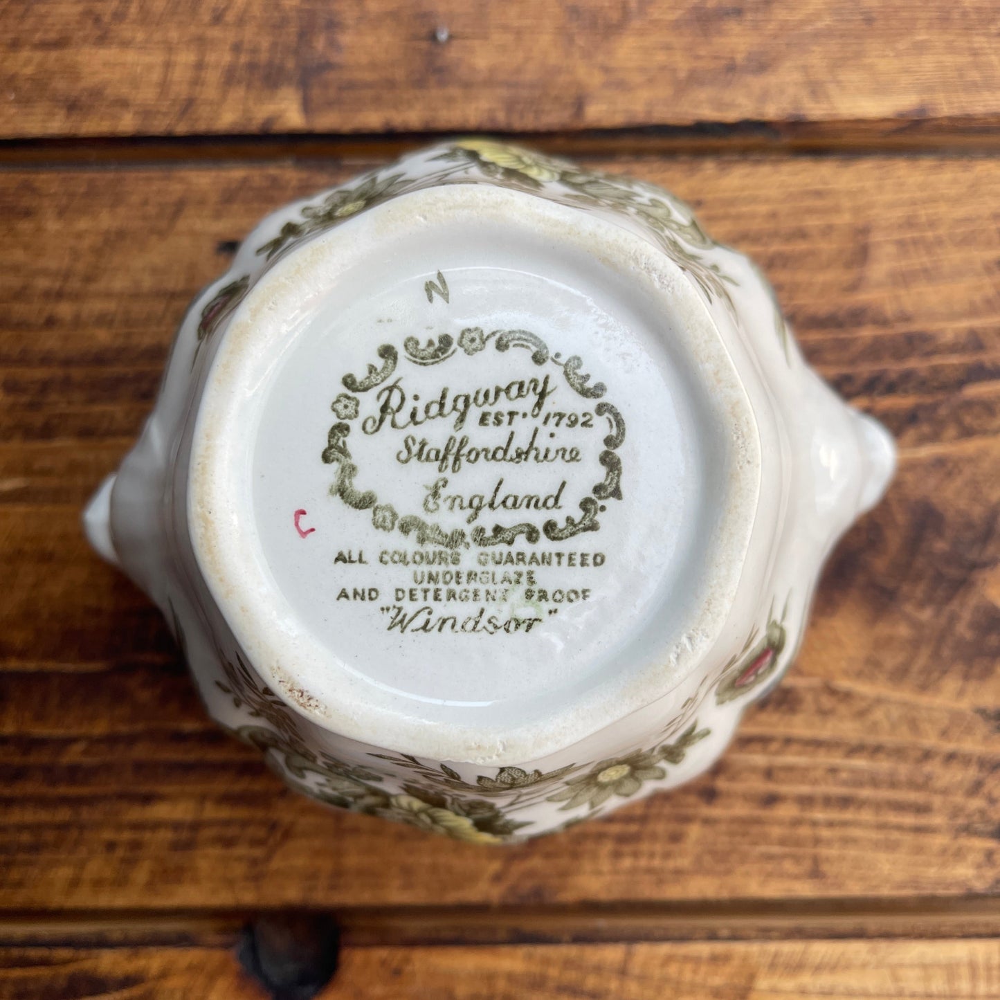 Ceramic product with 'Ridgway' branding on a wooden surface