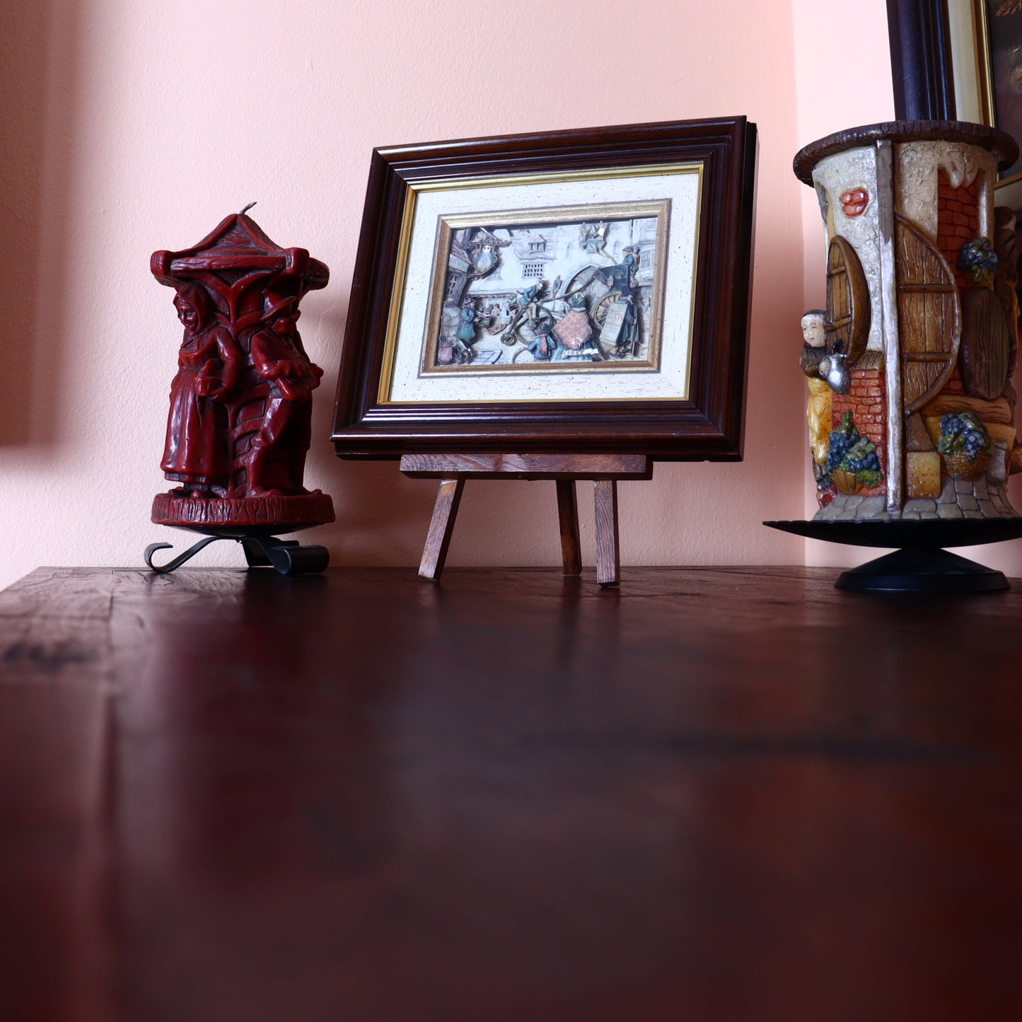 3D Paper Illustration by Anton Pieck of a street scene with a cyclist