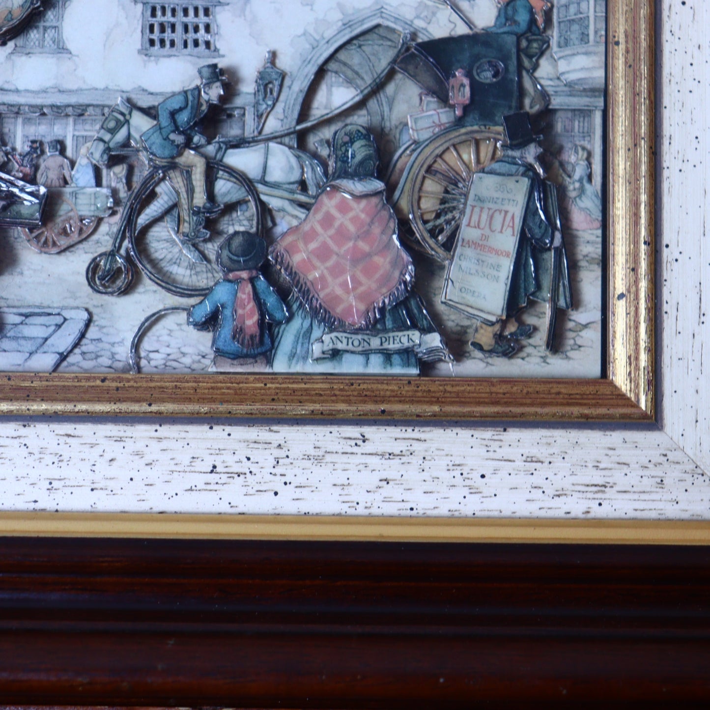 3D Paper Illustration by Anton Pieck of a street scene with a cyclist