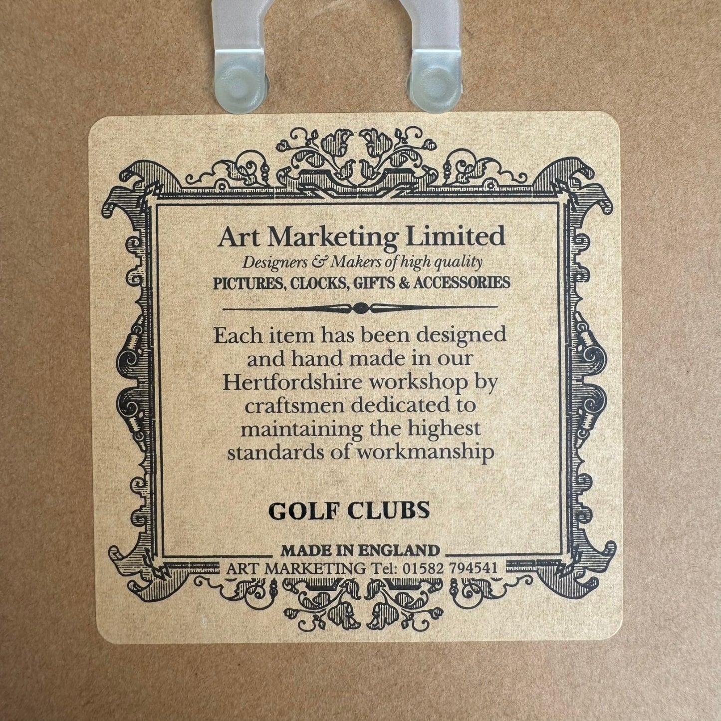 Vintage-style label for Art Marketing Limited on a brown background