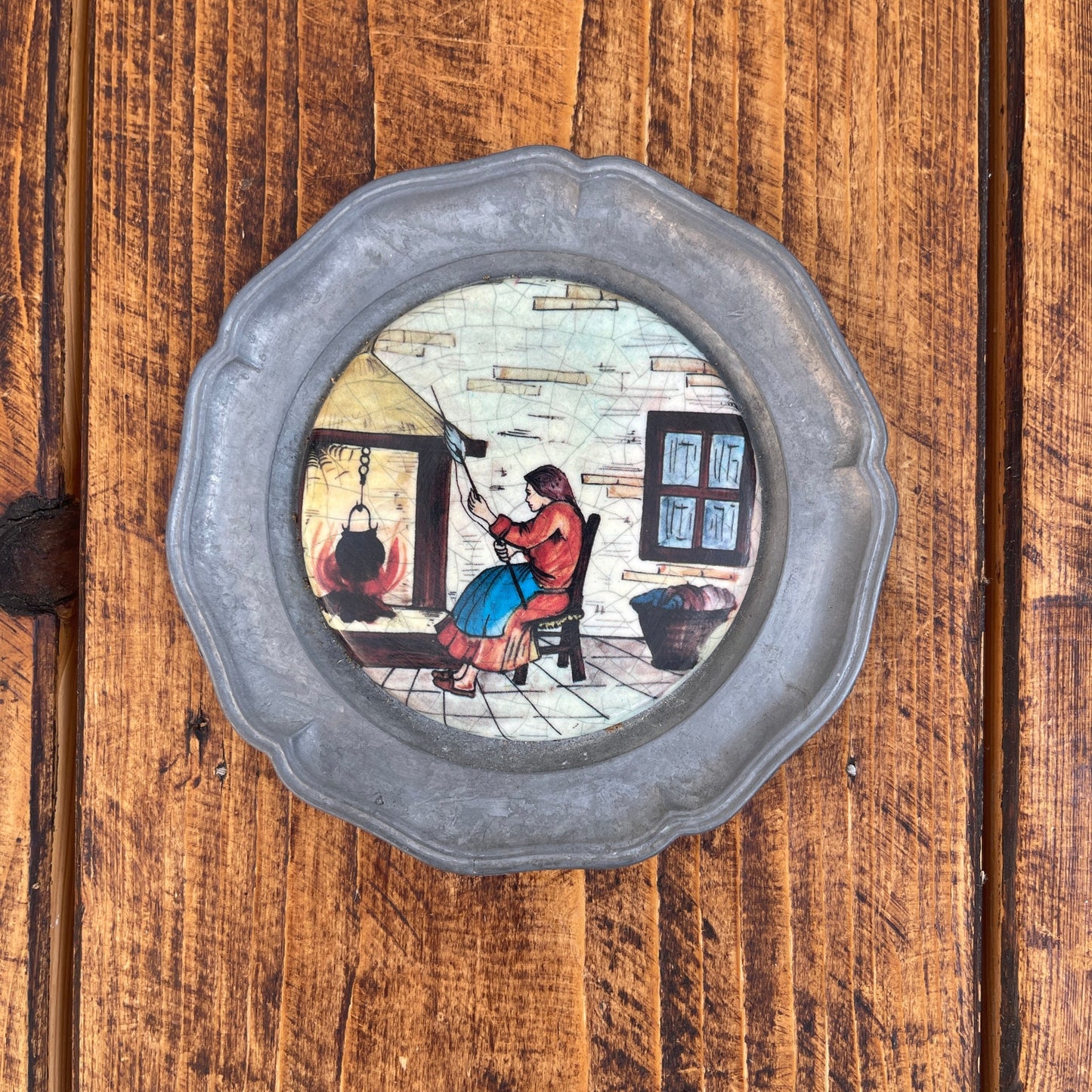 Decorative glass panel with a person and horse on a wooden background
