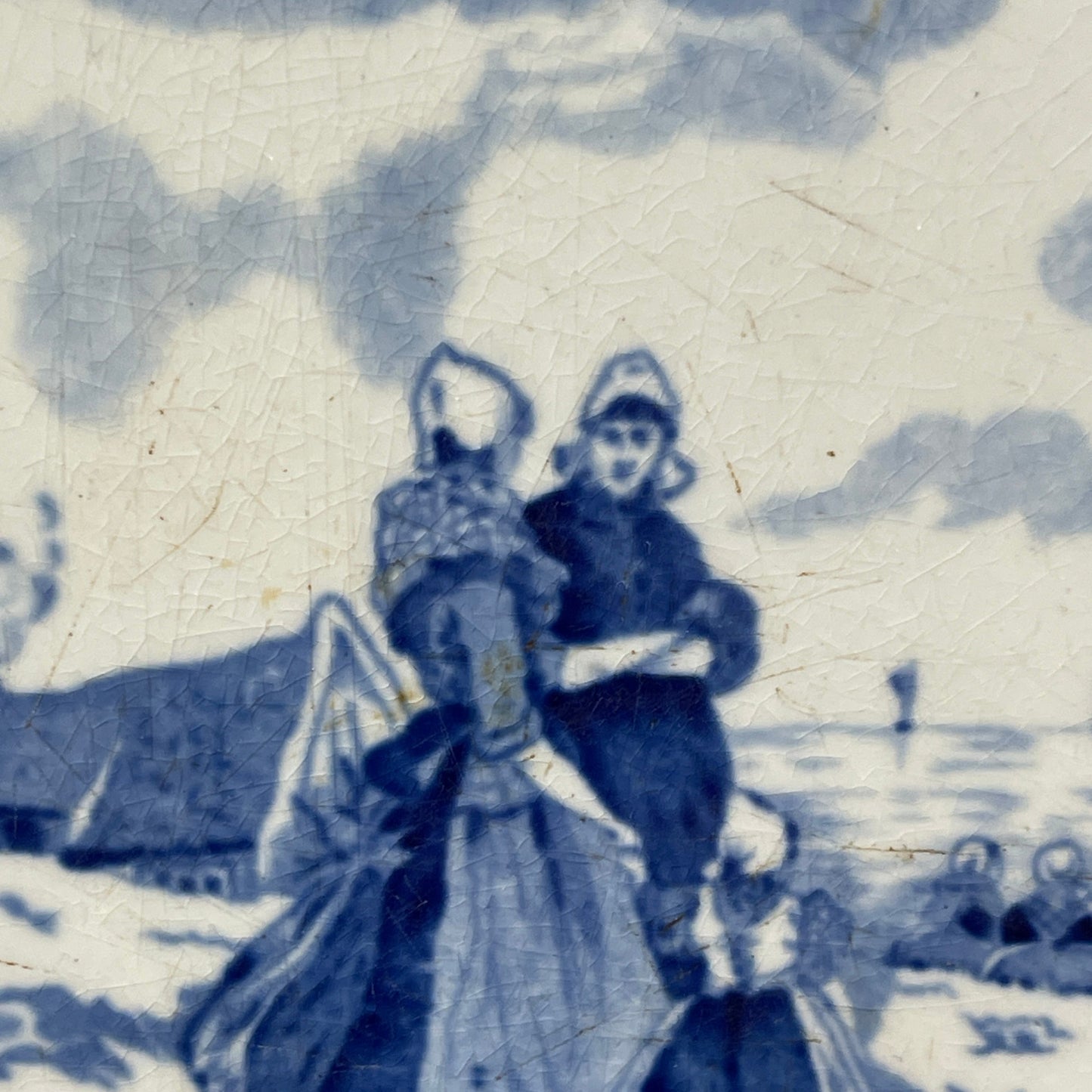 Vintage illustration of a woman with a parasol and a child on a horse against a cloudy sky.