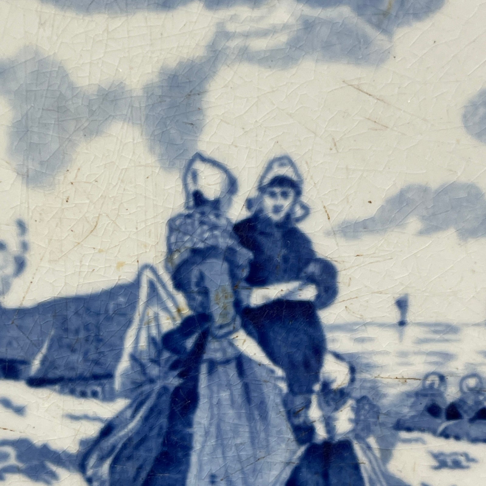 Vintage illustration of a woman with a parasol and a child on a horse against a cloudy sky.