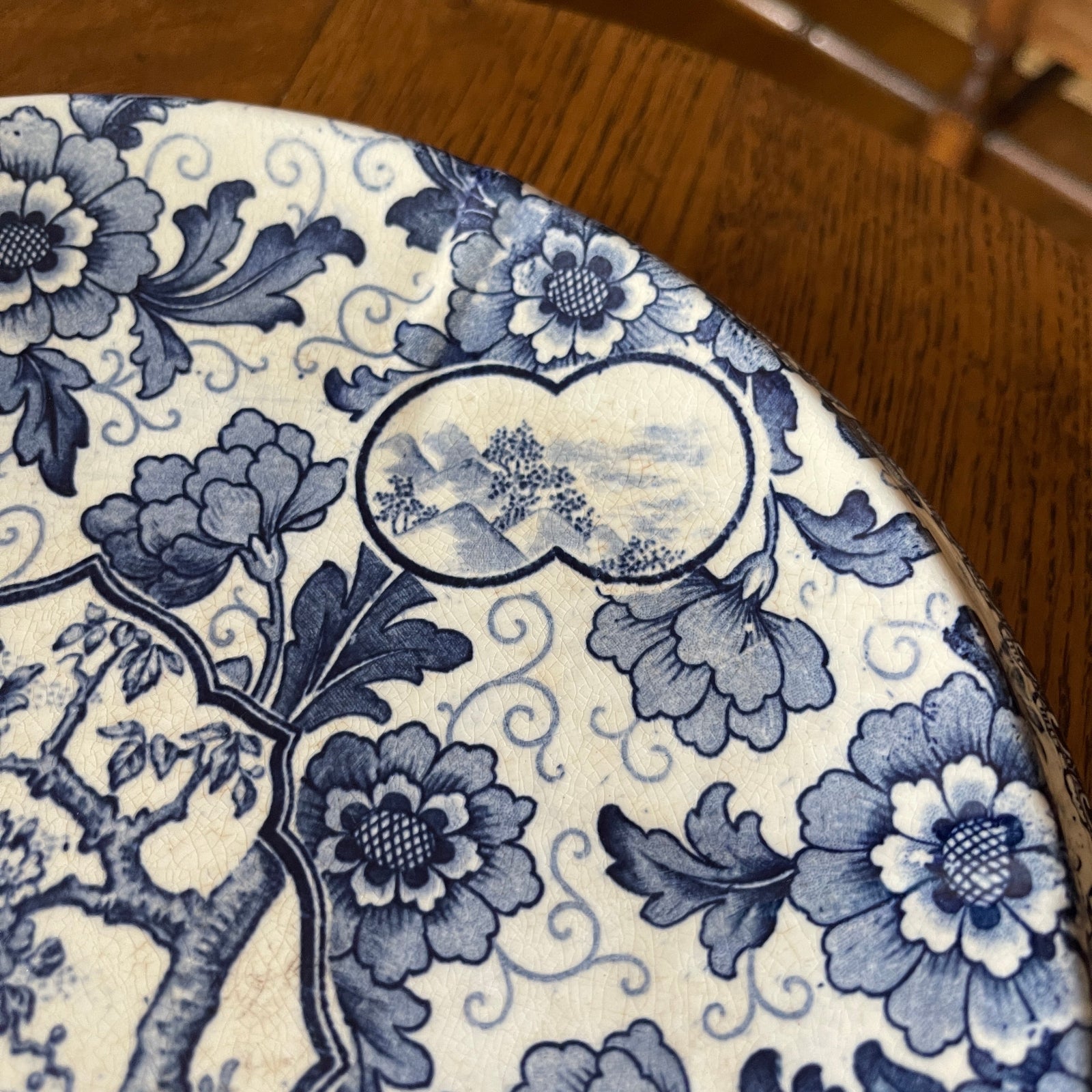 Close-up of a blue floral pattern on a white background