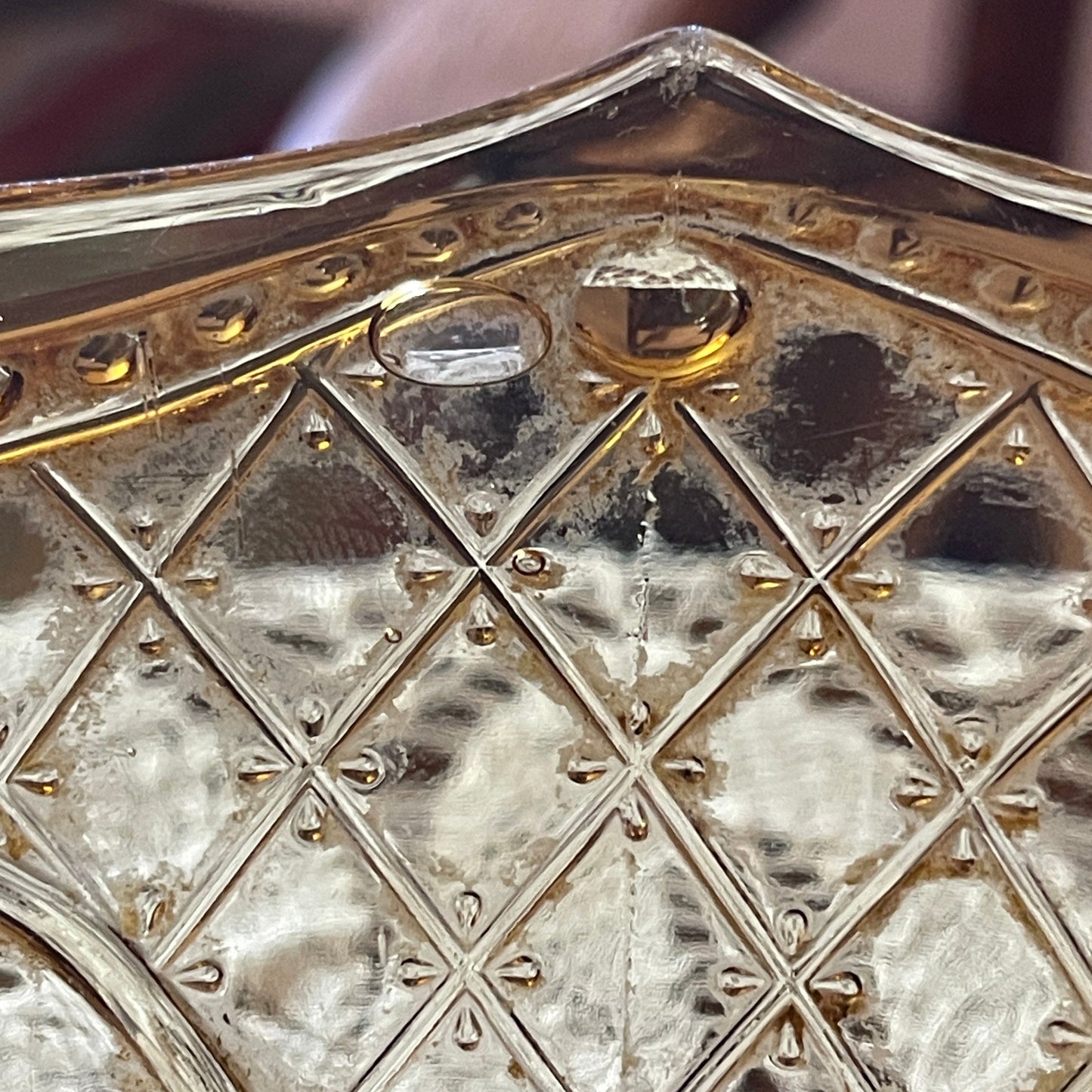 Close-up of a decorative metallic object with intricate patterns