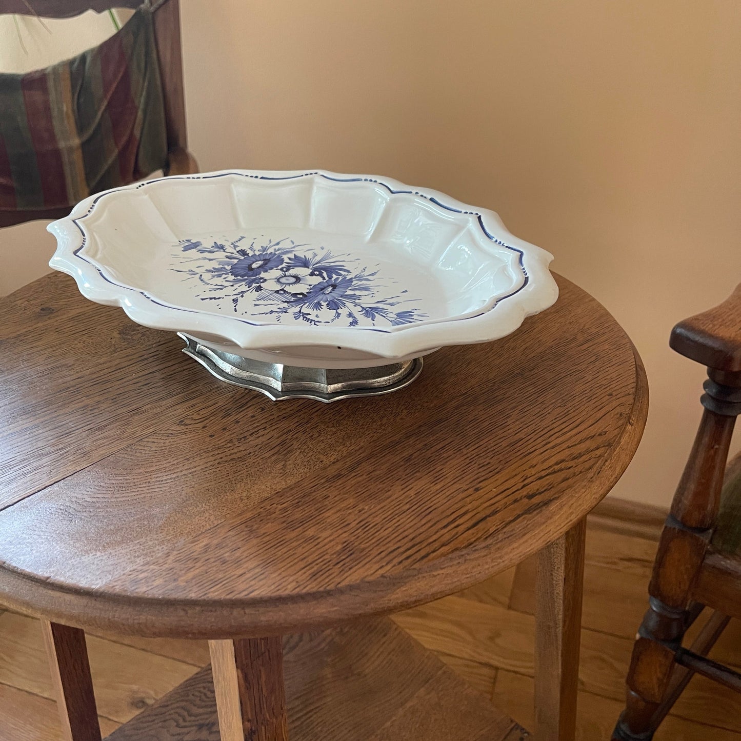 White ceramic dish with blue floral patterns on a wooden table