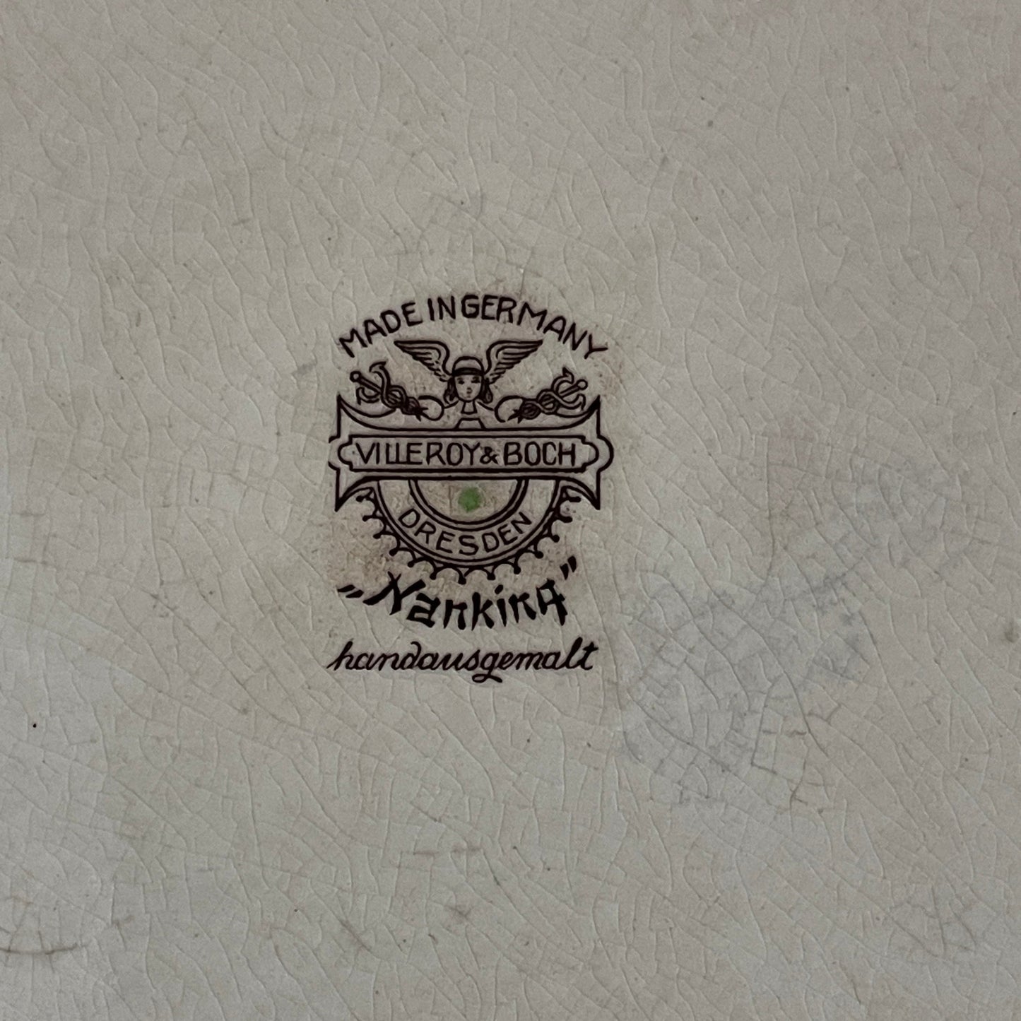 Villeroy & Boch logo on a textured surface