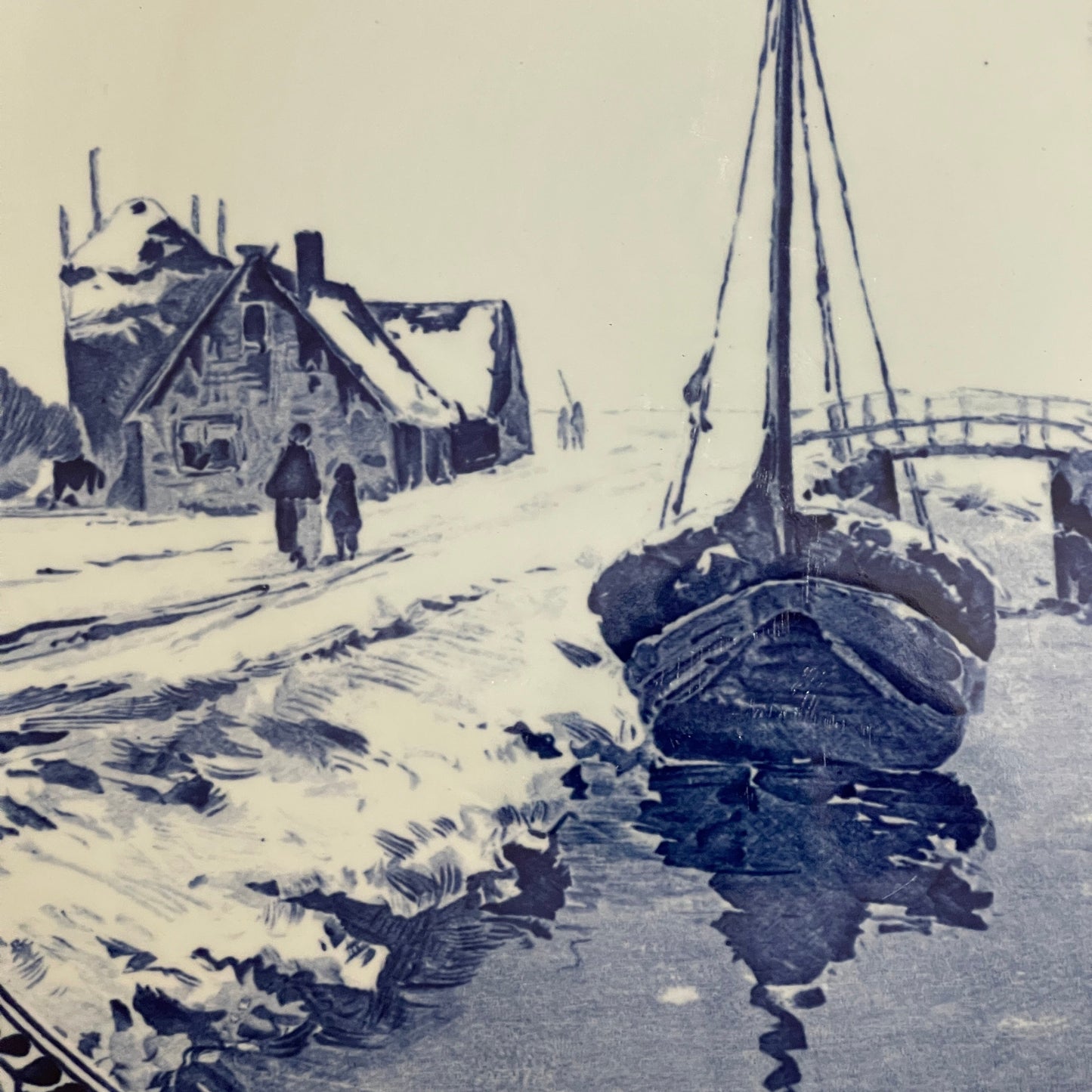 Black and white ink drawing of a snowy landscape with a boat, house, and people.