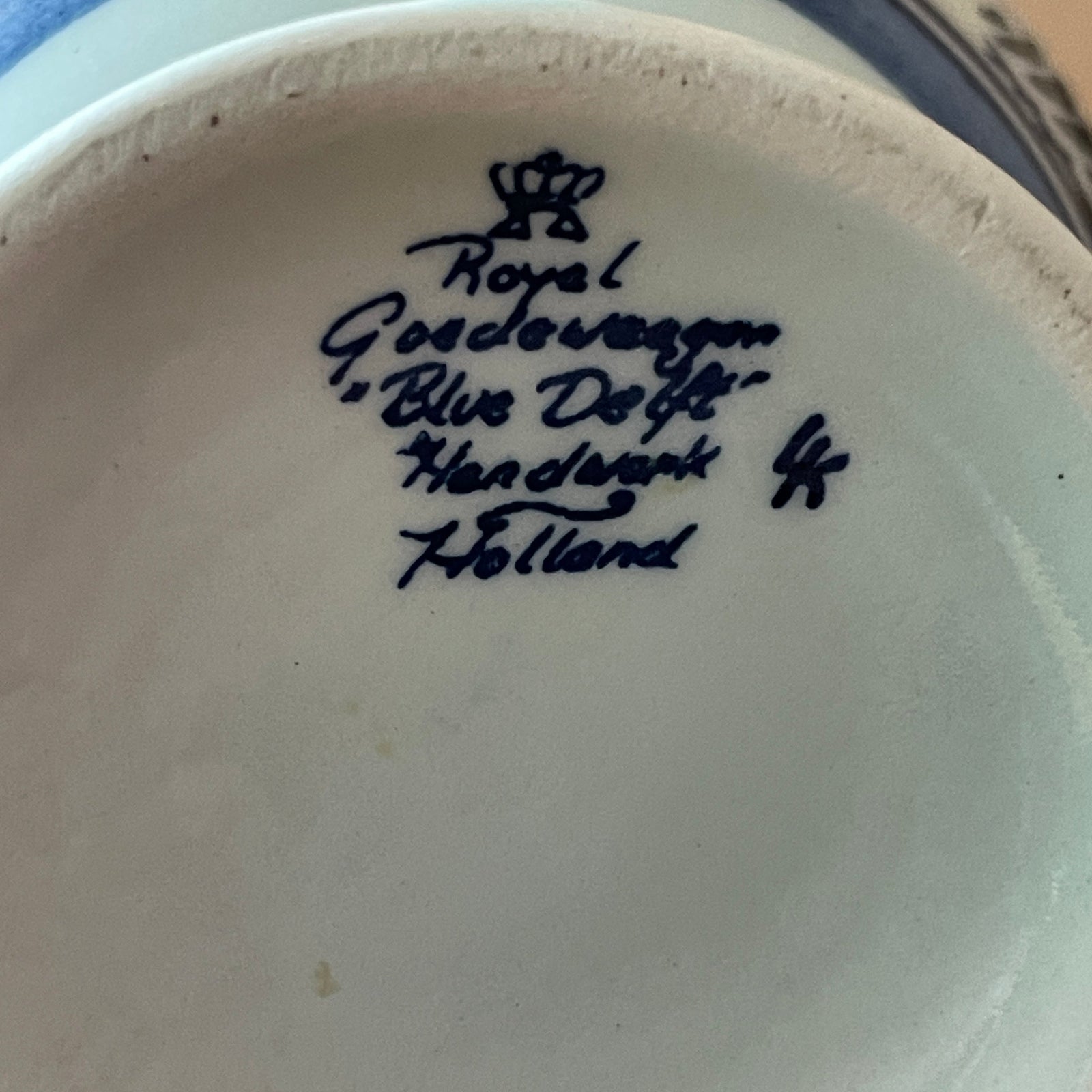Royal Delft logo and text on a ceramic product