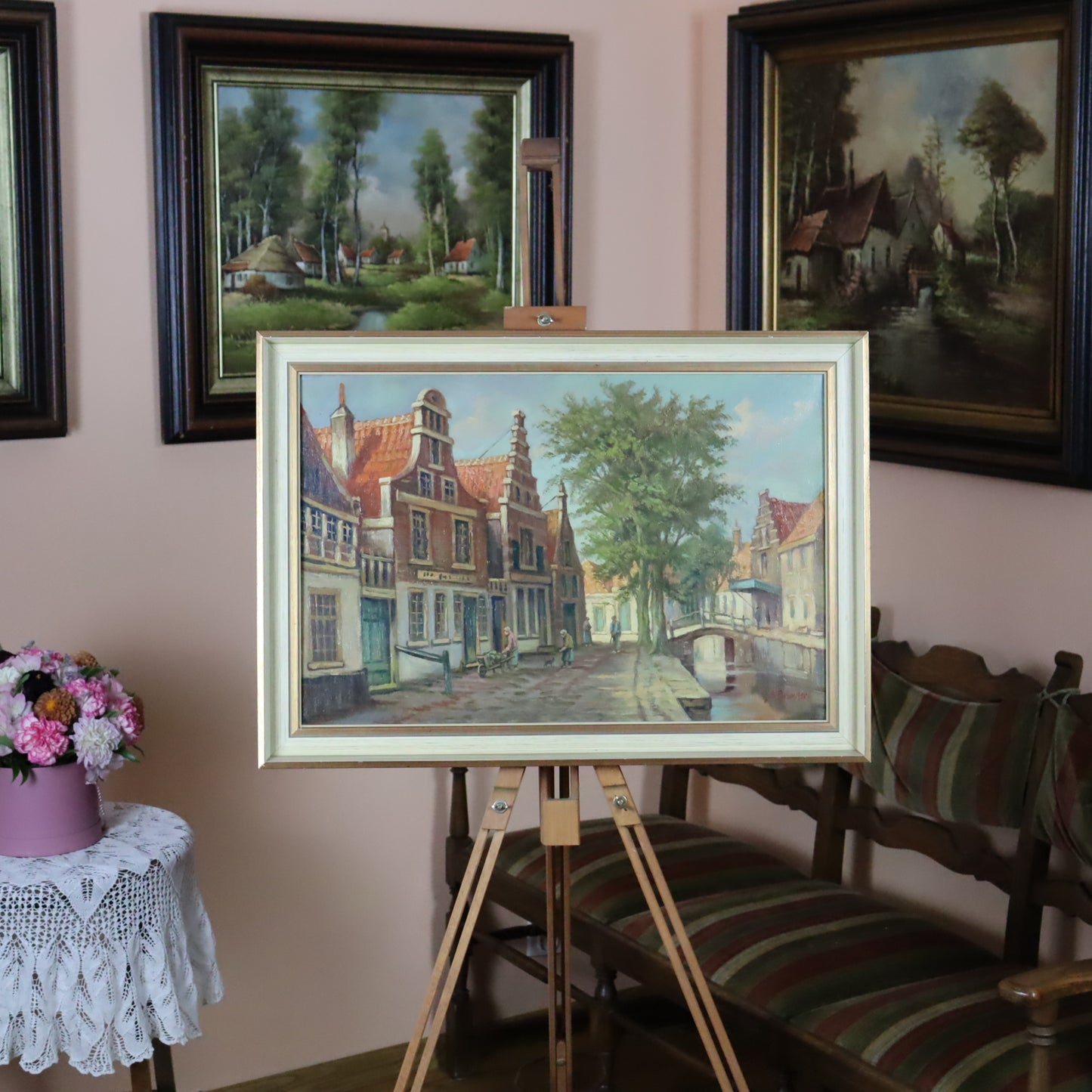 Oil painting of houses on the canal