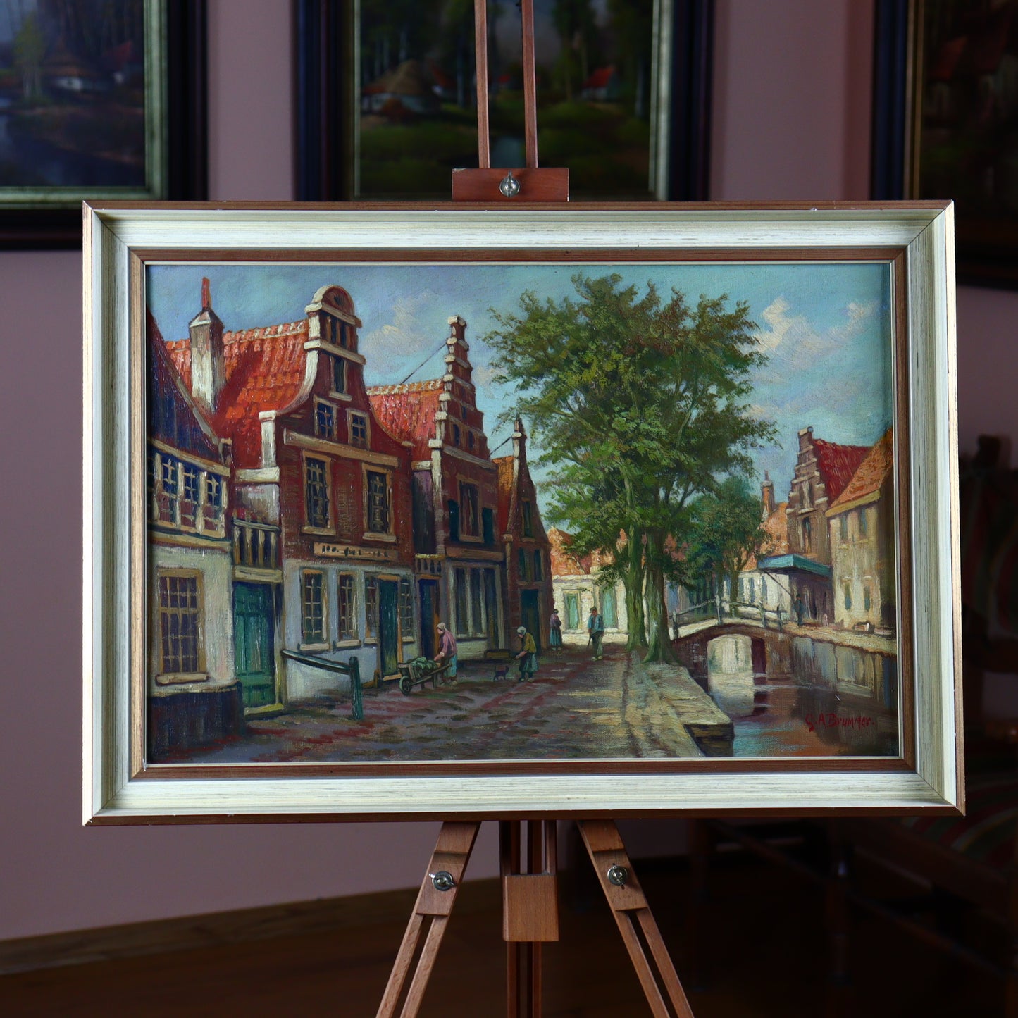 Oil painting of houses on the canal