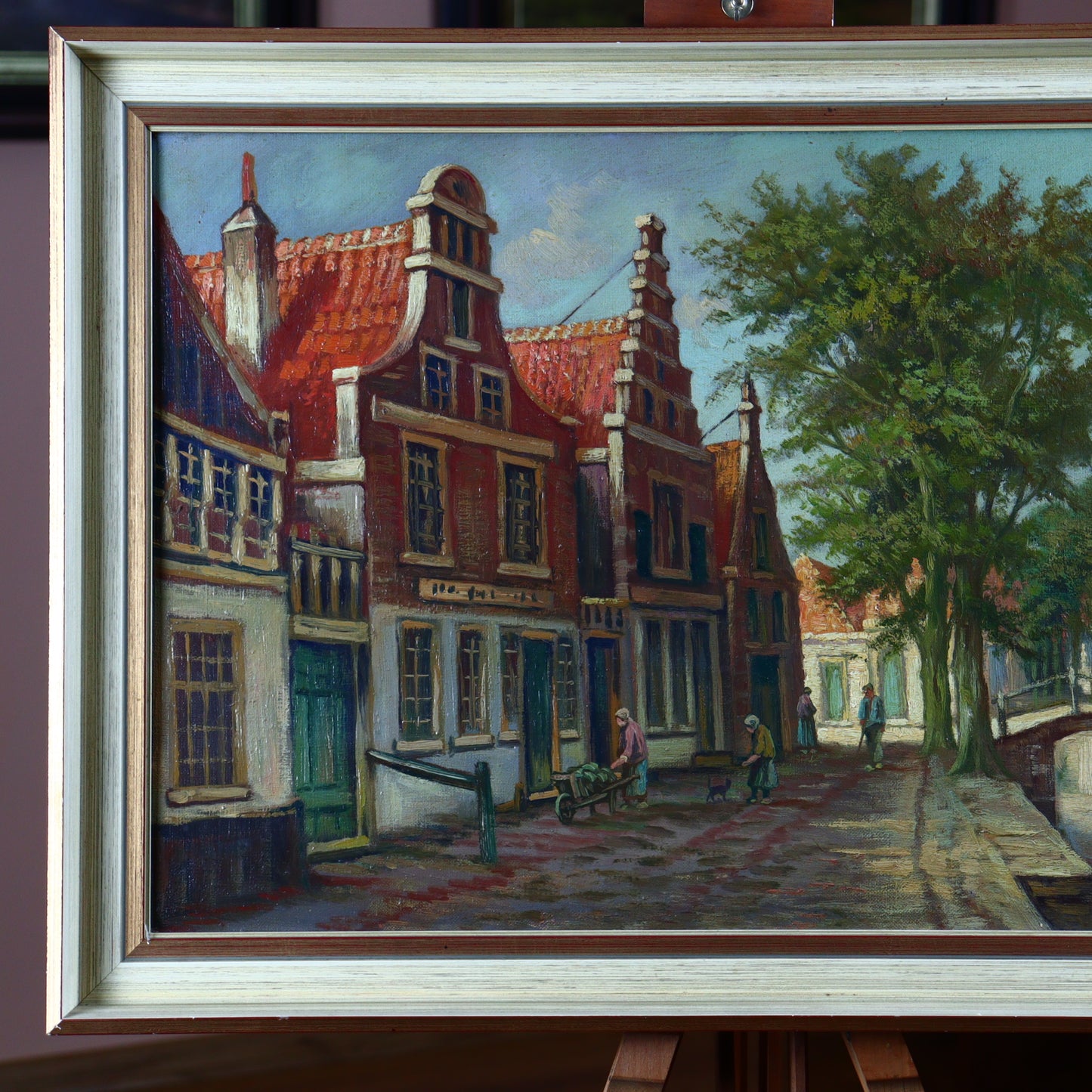 Oil painting of houses on the canal