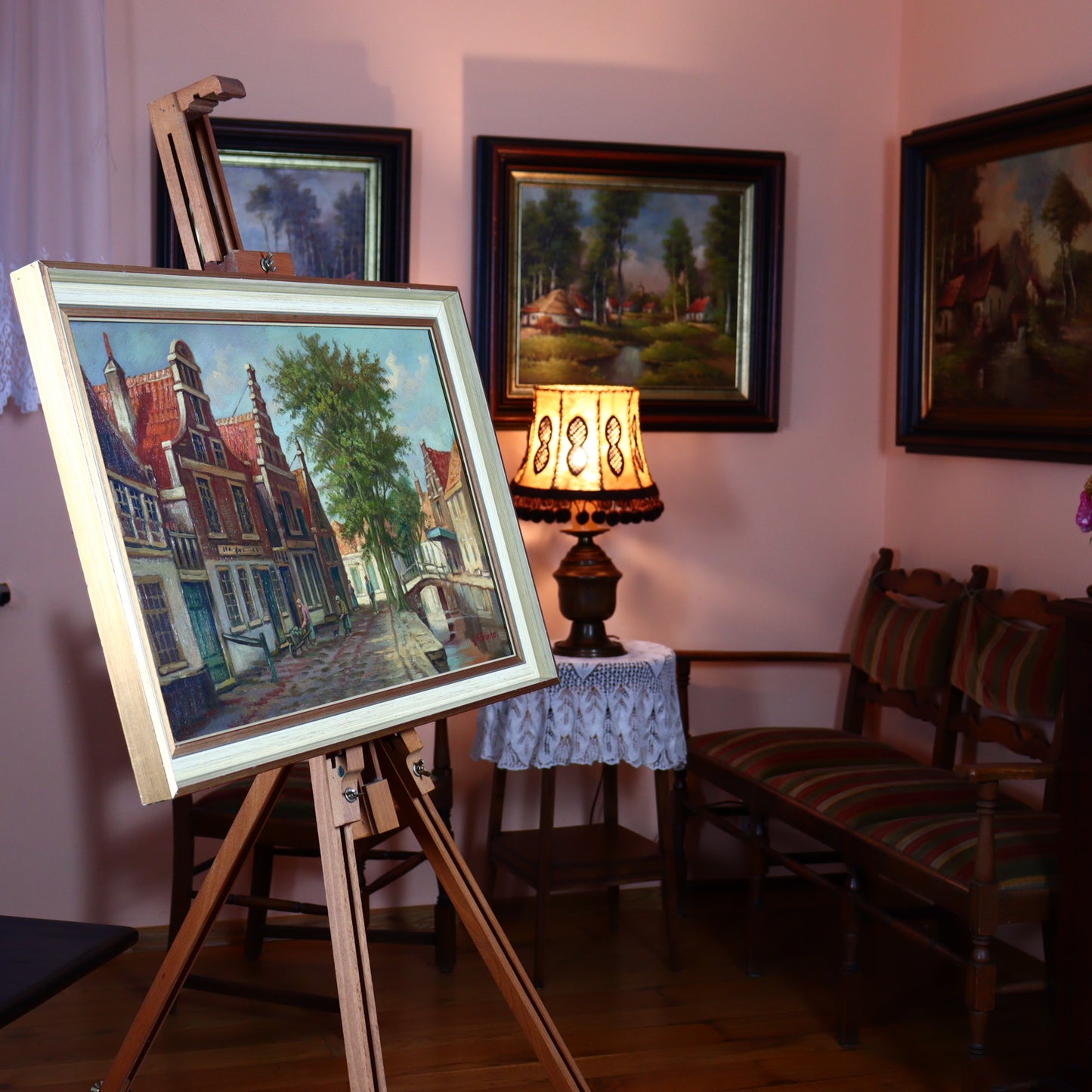 Oil painting of houses on the canal