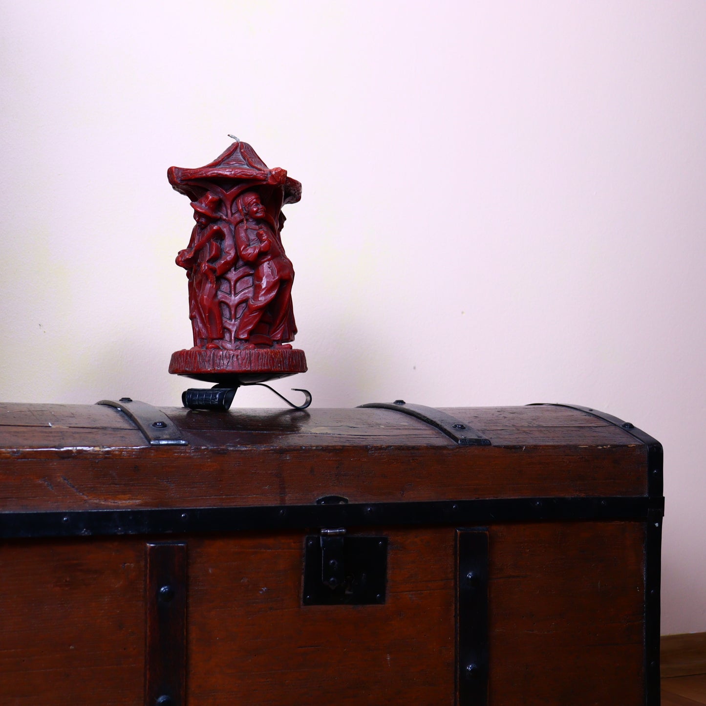 Old hand made candle decorated with village musicians