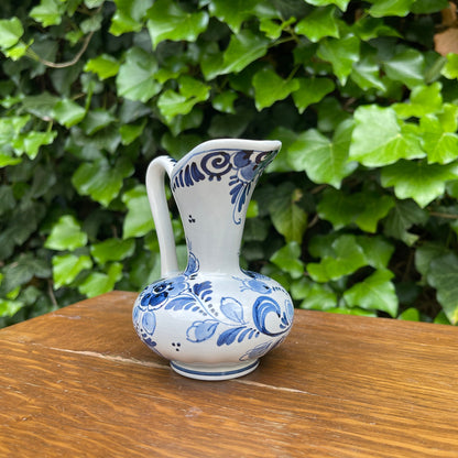 Small Delft style pitcher with peacock