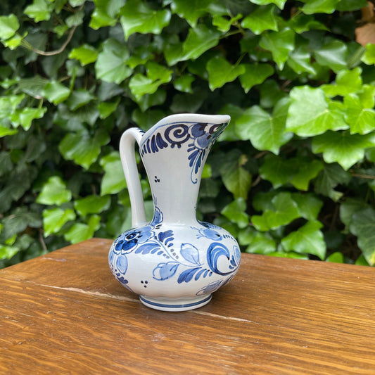 Small Delft style pitcher with peacock