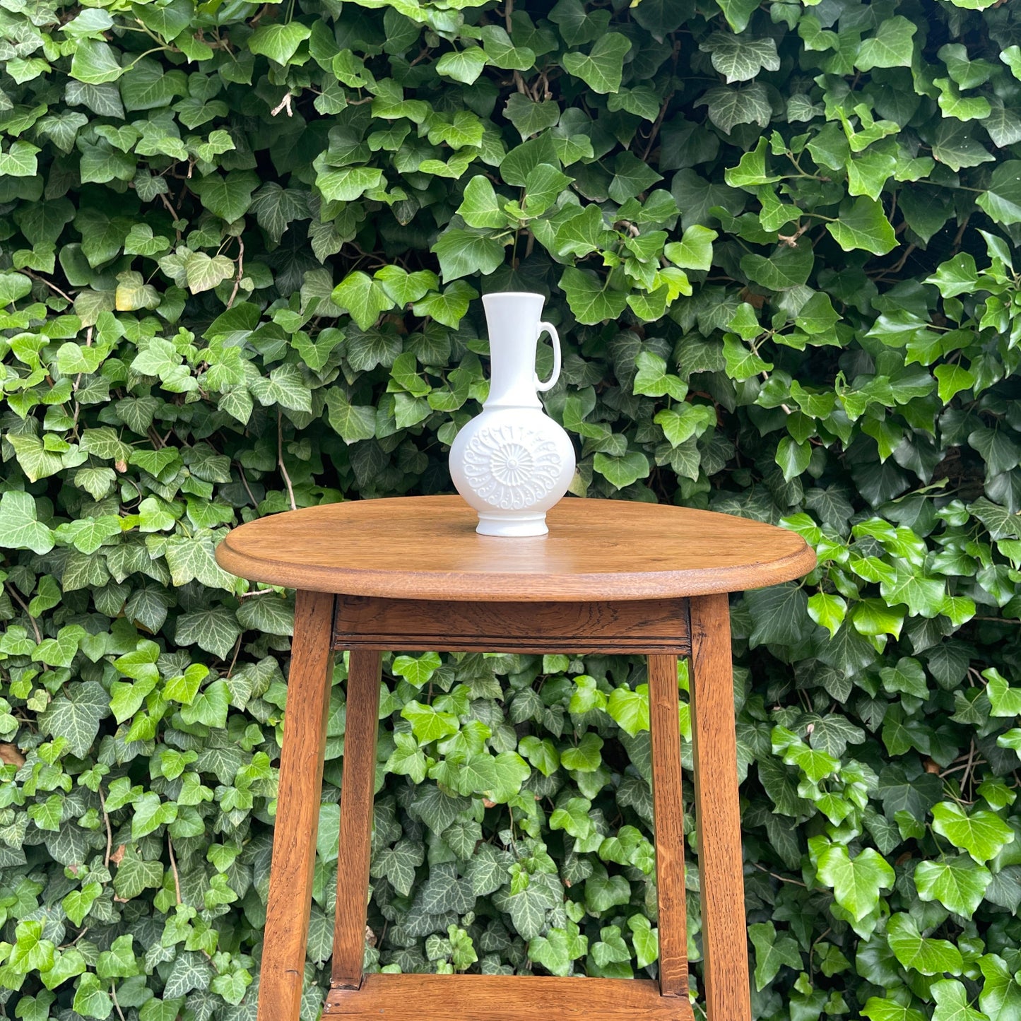 White Porcelain Pitcher-Style Vase with Relief Medallion
