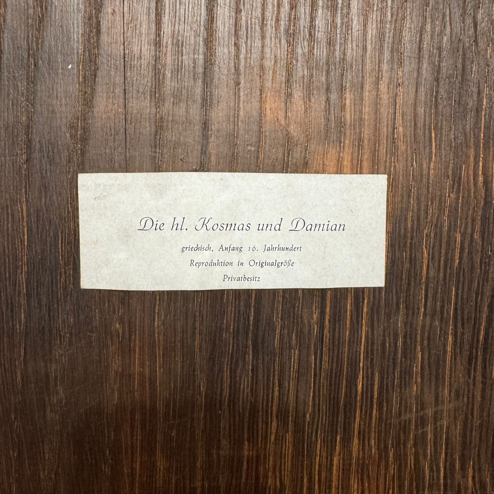 Text label on a wooden surface