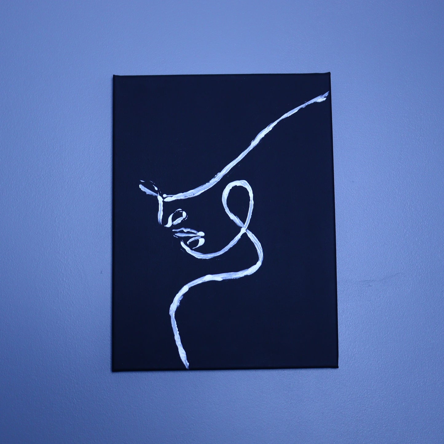 Painting on Canvas – Face Outline on Black