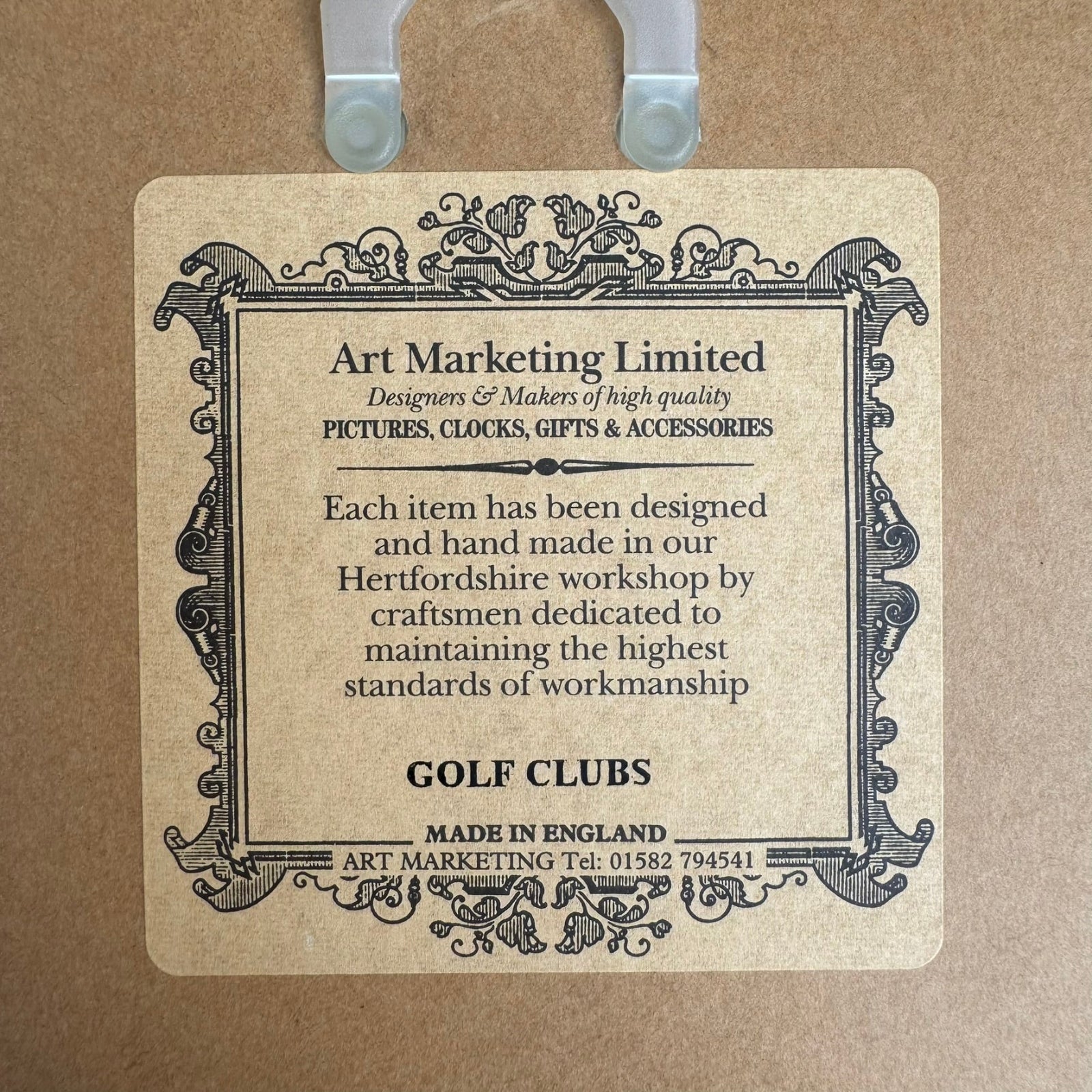 Vintage-style label for Art Marketing Limited on a brown background