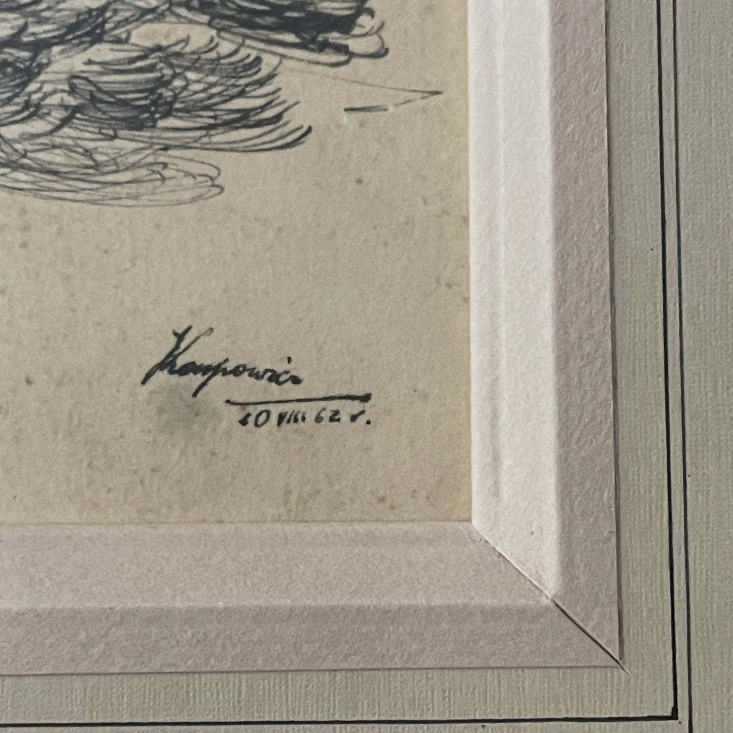 Artistic signature on a textured paper background