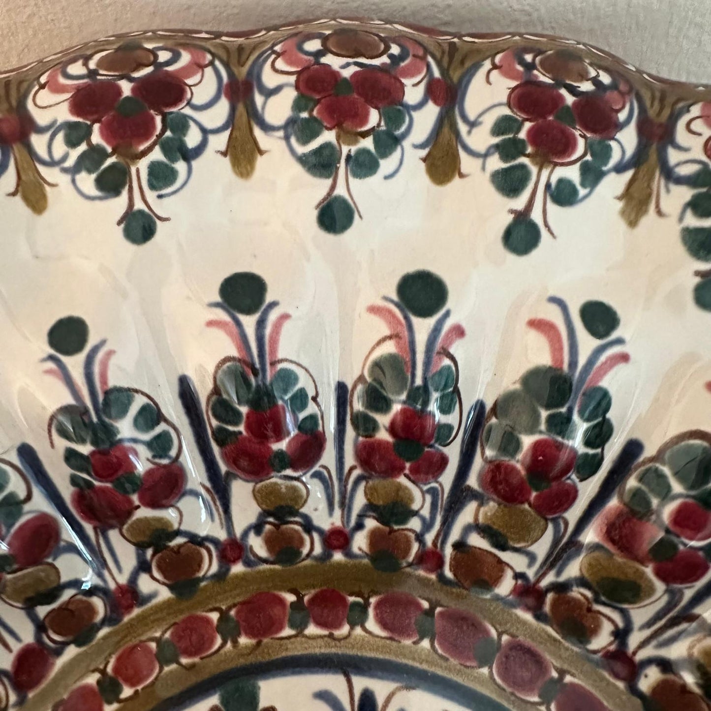 Close-up of a ceramic plate with floral patterns