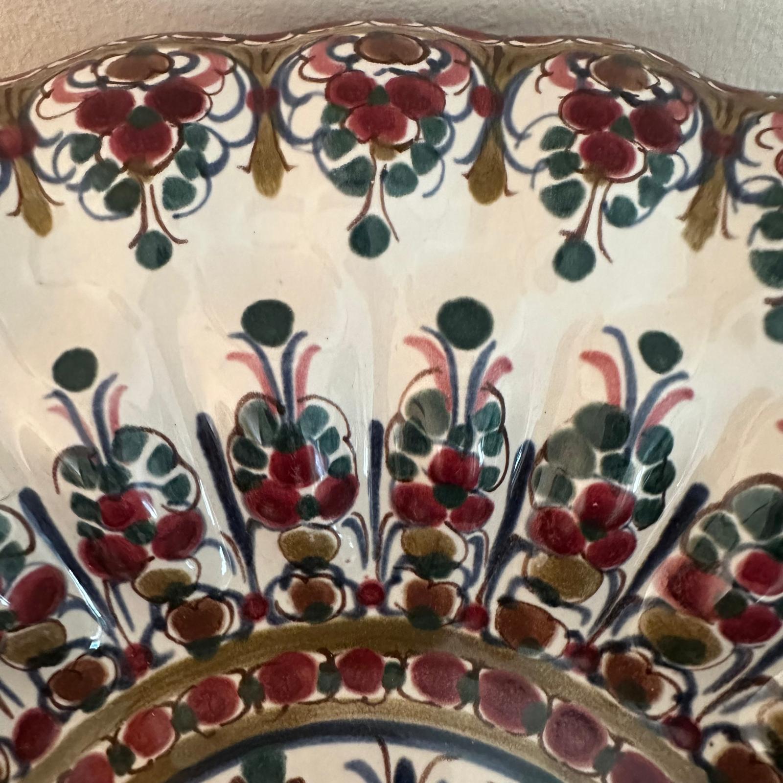 Close-up of a ceramic plate with floral patterns