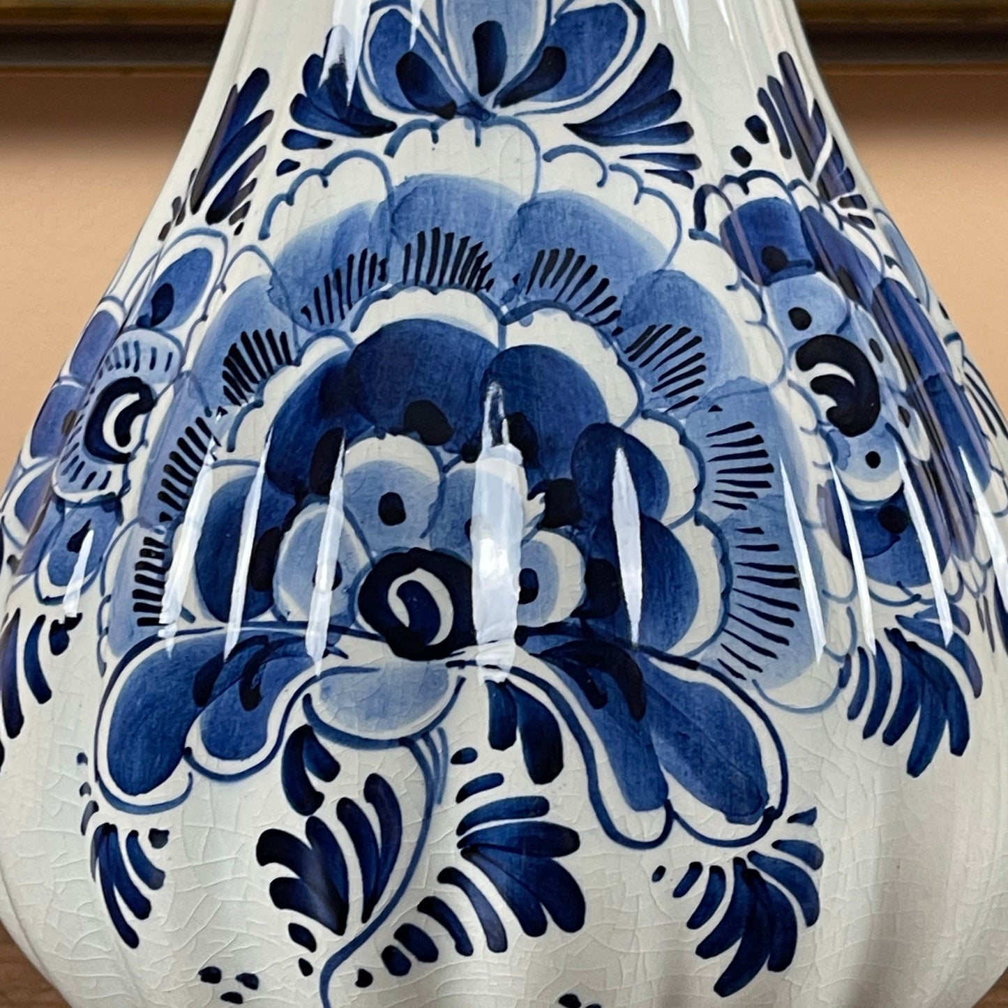 Decorative lamp with blue floral patterns on a white background