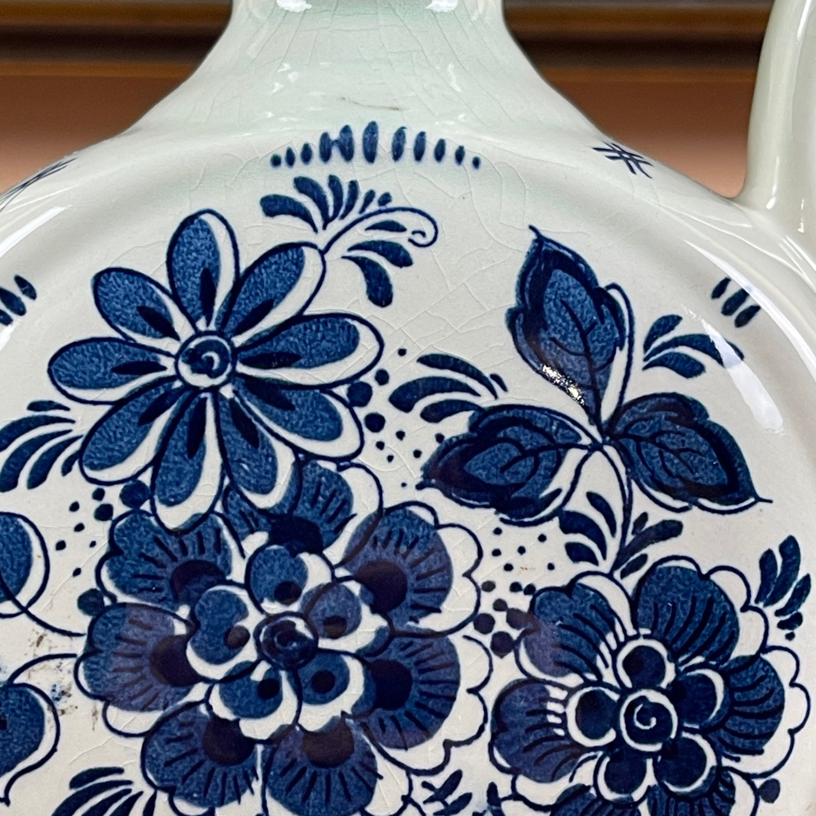 Ceramic dish with blue floral patterns on a white background
