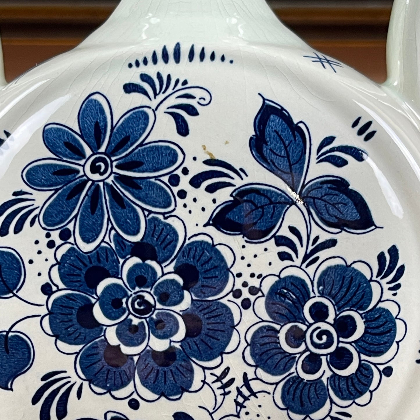 Ceramic dish with blue floral patterns on a white background
