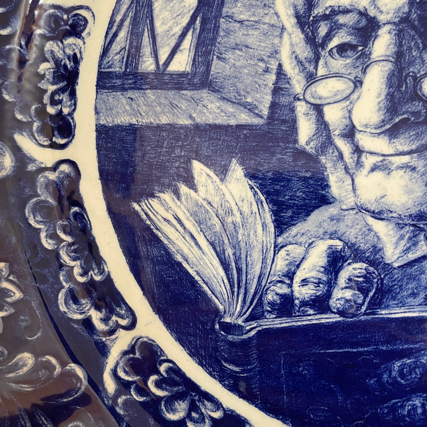 Illustration of a person reading a book with a decorative frame