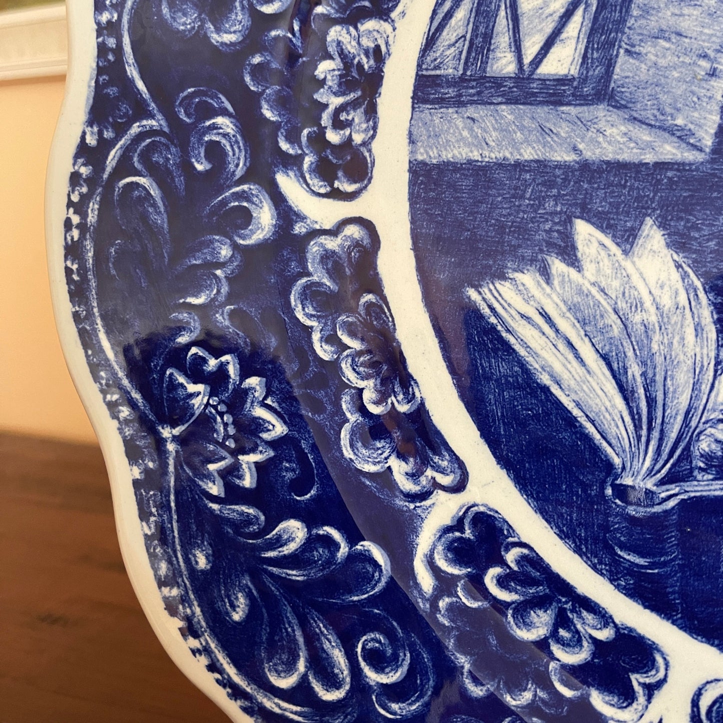 Close-up of a blue and white decorative plate with intricate patterns