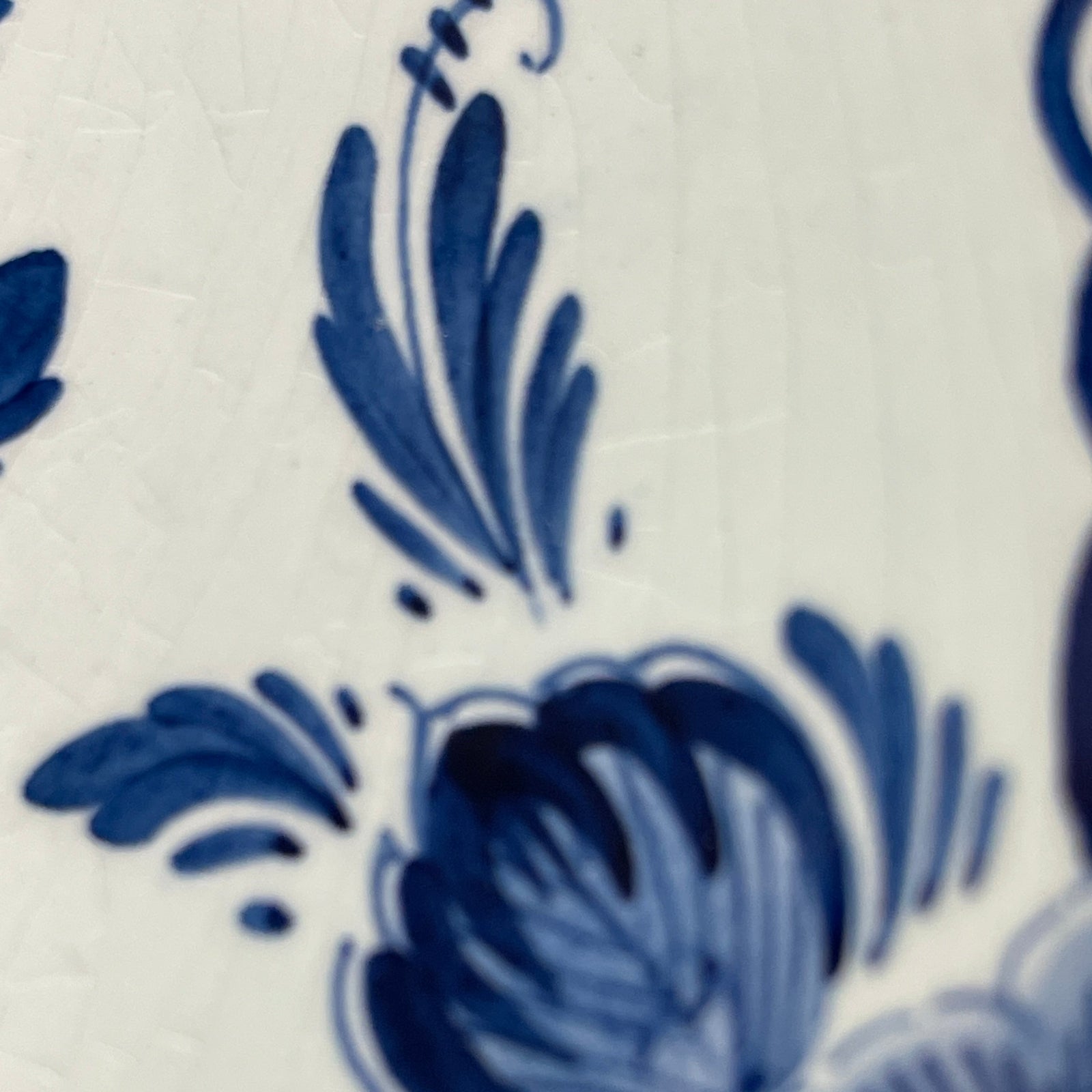 Close-up of blue floral pattern on a white background