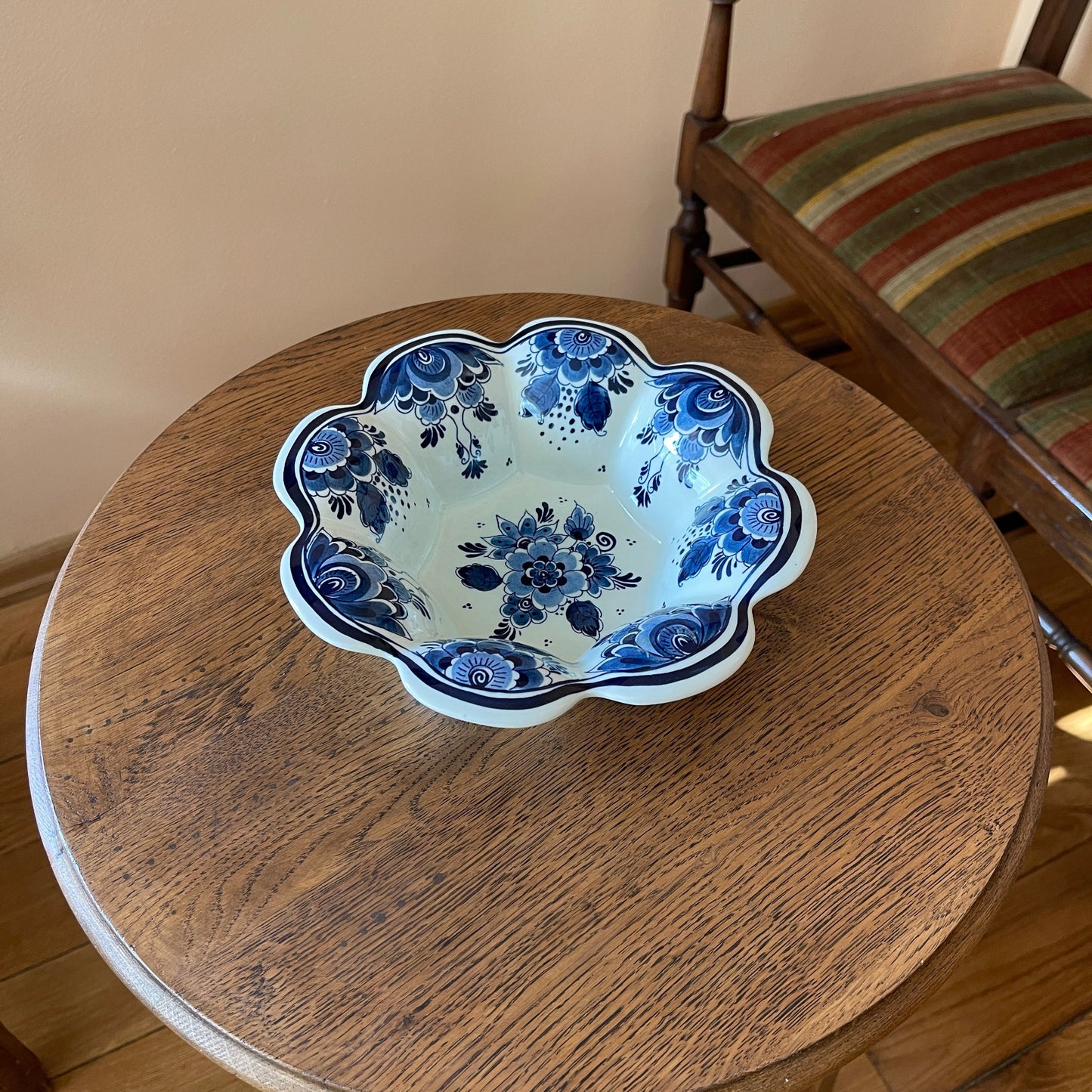 Ceramic bowl with blue floral design on a wooden table